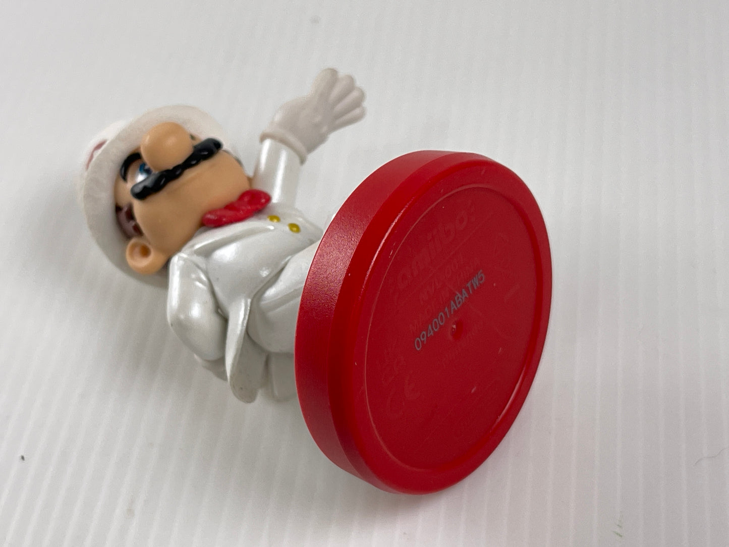 Nintendo Amiibo Mario in a white tuxedo and top hat figure