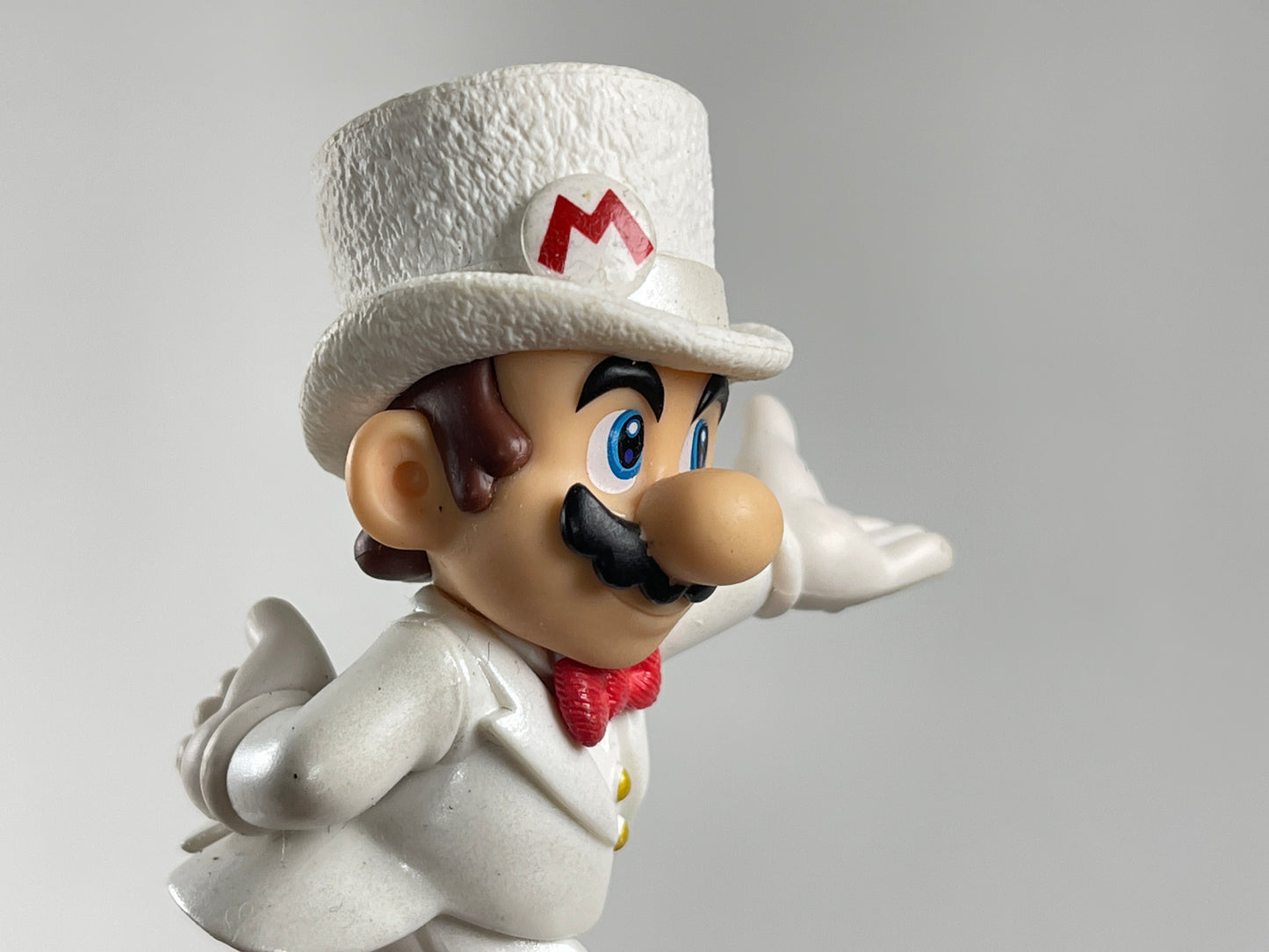 Nintendo Amiibo Mario in a white tuxedo and top hat figure