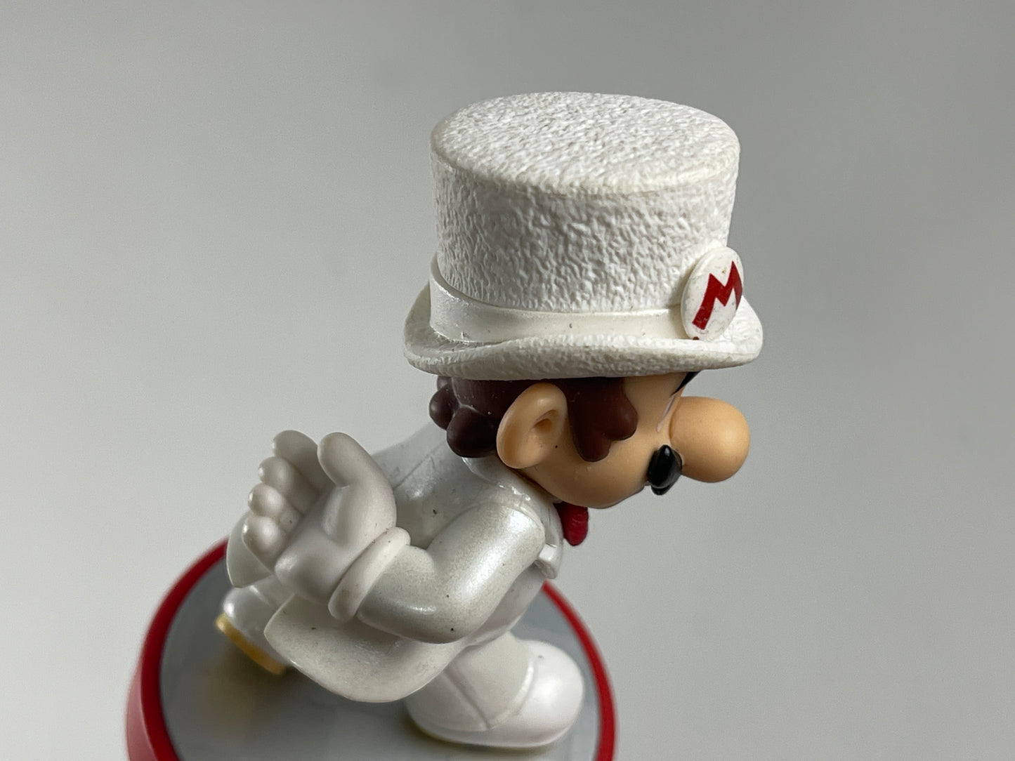 Nintendo Amiibo Mario in a white tuxedo and top hat figure